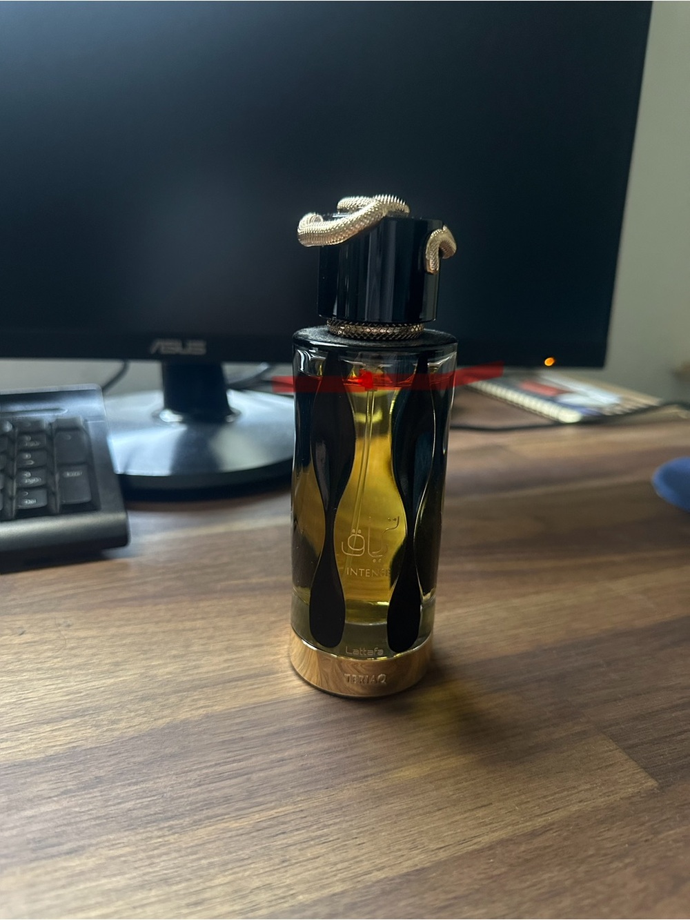Lattafa Luxury Amber & Black Fragrance Bottle